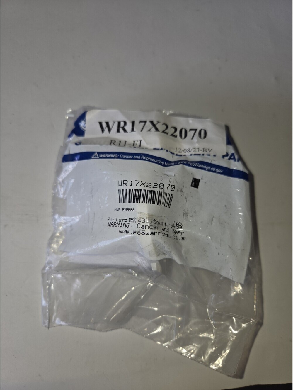 NEW / Genuine GE / WR17X22070 / Refrigerator Bypass Filter Plug A6
